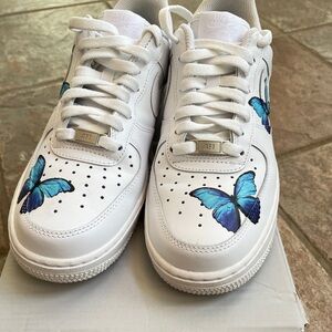 Nike White Sneakers with Blue Butterfly Design